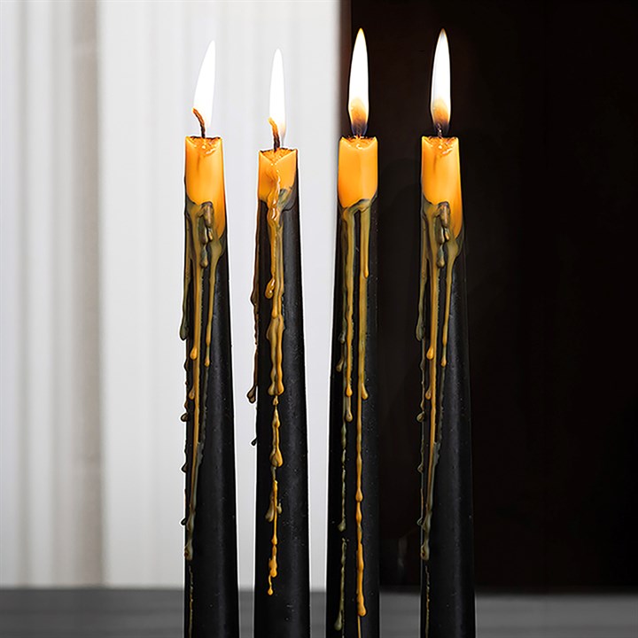 Set of 4 Pumpkin Guts Oozing Taper Candles Set of 4 Pumpkin Guts Oozing Taper Candles