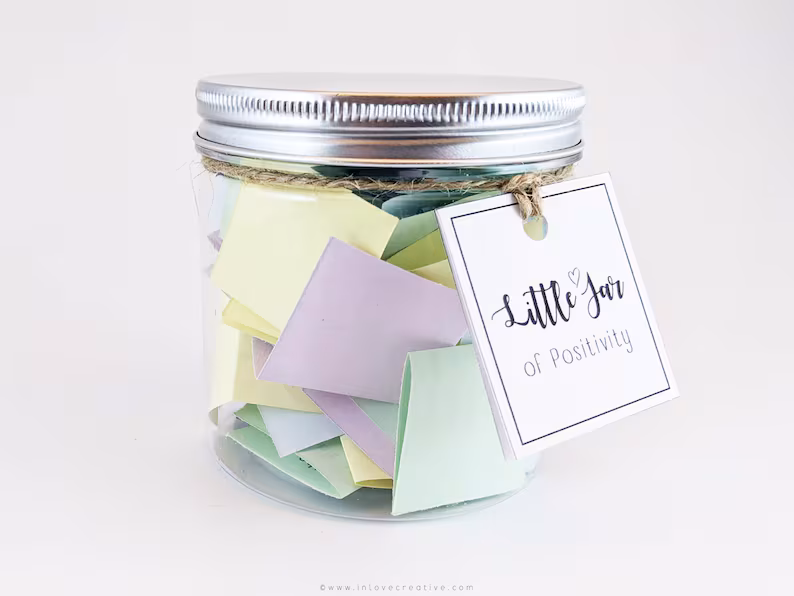 jar filled with paper notes expressing gratitude